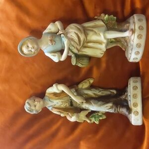 Vintage man and woman figurines. Hunter and fisher.